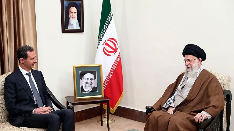 Iranian supreme leader, Supreme Leader Ayatollah Ali Khamenei, right, speaks with Syrian President Bashar Assad in a meeting in Tehran, Iran, 30 May 2024.