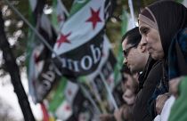 Protesters gather across the street from the Hotel Imperial in Vienna where Syria peace talks took place, 30 October, 2015