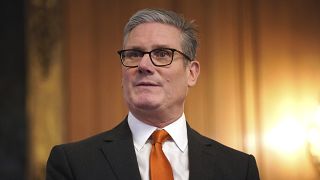 Britain's Prime Minister Keir Starmer makes a speech as he and his wife Victoria host a children's Christmas party inside 10 Downing Street, 13 December, 2024