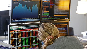 A fund manager looks at screens displaying activities of shares on the French Stock Exchange, in a financial analysis office in Paris, France, Tuesday, Aug. 25, 2015. A fund manager looks at screens displaying activities of shares on the French Stock Exchange, in a financial analysis office in Paris, France, Tuesday, Aug. 25, 2015.