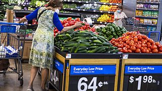 People buy groceries at a Walmart Superstore in Secaucus, New Jersey, July 11, 2024. 