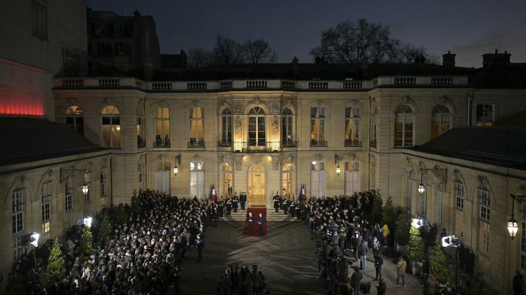 France's newly appointed Prime Minister Francois Bayrou and outgoing Prime minister Michel Barnier speak at Matignon, Paris. 13 December, 2024.