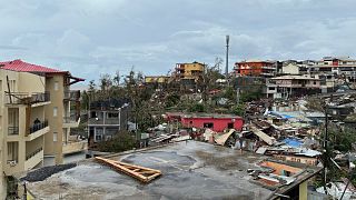 Damaged houses are seen in Mamoudzou, in the French Indian Ocean territory of Mayotte.