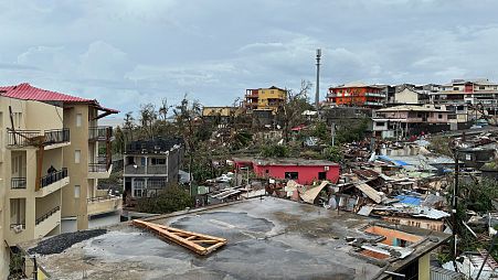 Damaged houses are seen in Mamoudzou, in the French Indian Ocean territory of Mayotte.