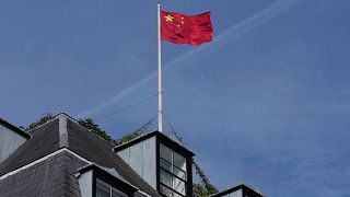  A Chinese national flag is raised at the Chinese embassy in London, Monday, 11 September 2023.