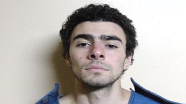 На этой фотографии, опубликованной Департаментом исправительных учреждений Пенсильвании, изображен Луиджи Манджионе, подозреваемый в смертельном убийстве генерального директора UnitedHealthcare Брайана Томпсона. На этой фотографии, опубликованной Департаментом исправительных учреждений Пенсильвании, изображен Луиджи Манджионе, подозреваемый в смертельном убийстве генерального директора UnitedHealthcare Брайана Томпсона.