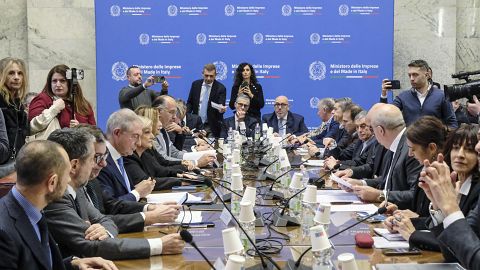 Executives from Stellantis and economic, labor and economic development ministers sit during a meeting held at the Ministry of Enterprise and Made in Italy in Rome.