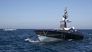 American unmanned surface vessels MAST-13 and MANTAS T-38, operate in the Arabian Gulf during a military exercise.