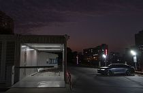 A first generation battery swapping station by China-based CATL battery manufacturing company, is seen in Xiamen, Fujian province, China, Wednesday, Dec. 18, 2024.