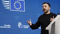 Ukraine's President Volodymyr Zelenskyy speaks addresses a media conference during an EU summit in Brussels,  Dec. 19, 2024. 