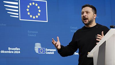 Ukraine's President Volodymyr Zelenskyy speaks addresses a media conference during an EU summit in Brussels,  Dec. 19, 2024. 