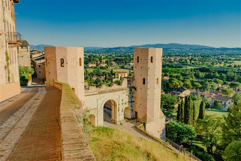 View of the city and small lanes of the town of Spello in Umbria province of Perugia, Italy