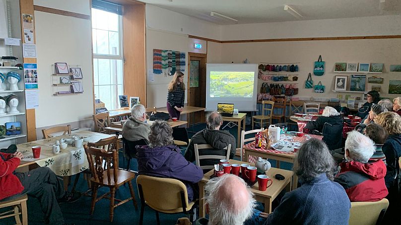 Residents gather for a climate action film screening at Bressay Community Centre