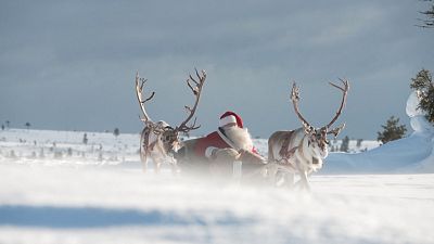 Father Christmas in his sleigh on his way to distribute presents worldwide, Korvatunturi, Lapland in Finland, 19.12.2024