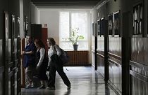 Children walk in the corridor of Primary School number 223 in Warsaw, 3 April 2024