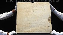 The oldest complete tablet of the Ten Commandments, weighing 115-pounds and approximately 1,500 years old, displayed at Sotheby's in New York