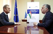 European Council President Donald Tusk, left, speaks with Hungarian Prime Minister Viktor Orban during a meeting prior to an EU summit in Sibiu, Romania, Thursday, May 9, 2019