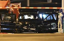 Forensics work on a damaged car after a driver ploughed into a busy Christmas market in Magdeburg, 21 December, 2024