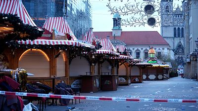 Police tape cordons-off a Christmas Market, where a car drove into a crowd on Friday evening, in Magdeburg, Germany, Saturday, 20 December 2024.