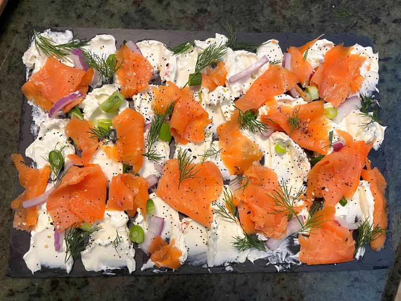A cream cheese and smoked salmon board. Butter boards have become the polarizing stepchild of charcuterie boards.