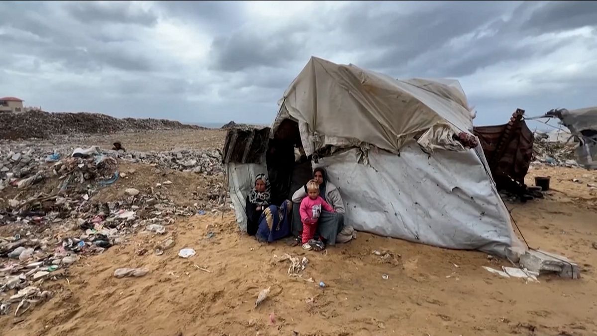 Palestinian displaced families in central Gaza face harsh winter in their tattered tents