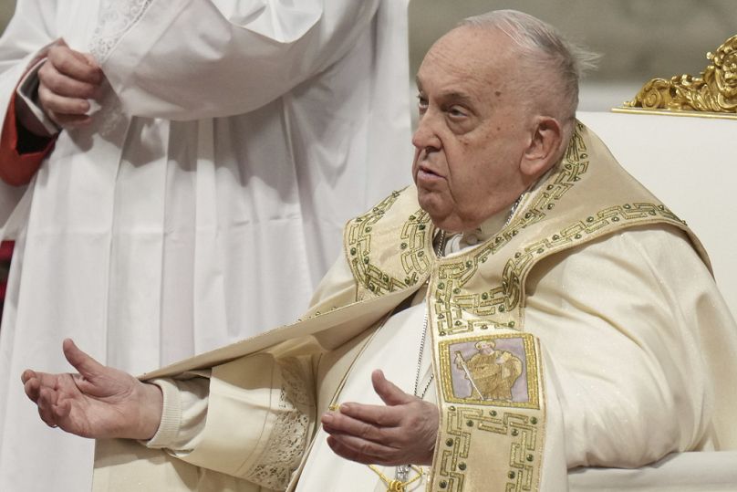 Pope Francis presides over the Christmas Eve Mass in St. Peter's Basilica at The Vatican, Tuesday, Dec. 24, 2024