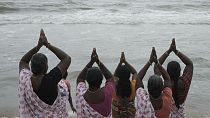 Indians pay tribute to the victims of the 2004 tsunami on its 20th anniversary, at Marina Beach in Chennai, India, on 26.12.2024.