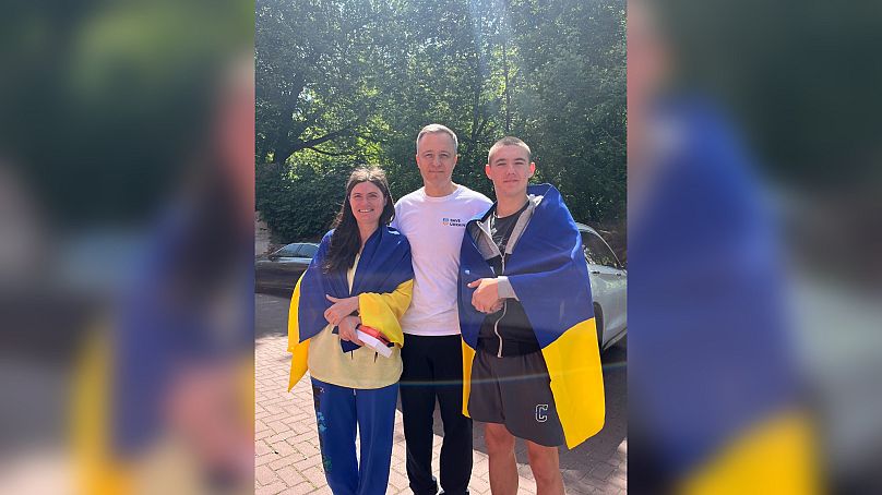 Vlad Rudenko with his mother Tetyana Bodak and Mykola Kuleba, head of ‘Save Ukraine’ 
