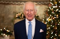 Britain's King Charles III speaks during the recording of his Christmas message at the Fitzrovia Chapel in central London, England.
