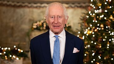 Britain's King Charles III speaks during the recording of his Christmas message at the Fitzrovia Chapel in central London, England.