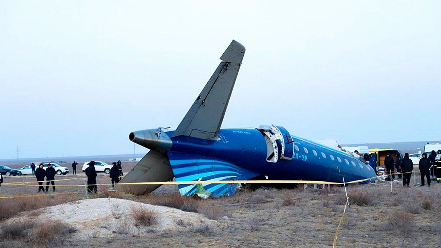 a part of Azerbaijan Airlines' Embraer 190 lies on the ground near the airport of Aktau, Kazakhstan, 26 December 2024
