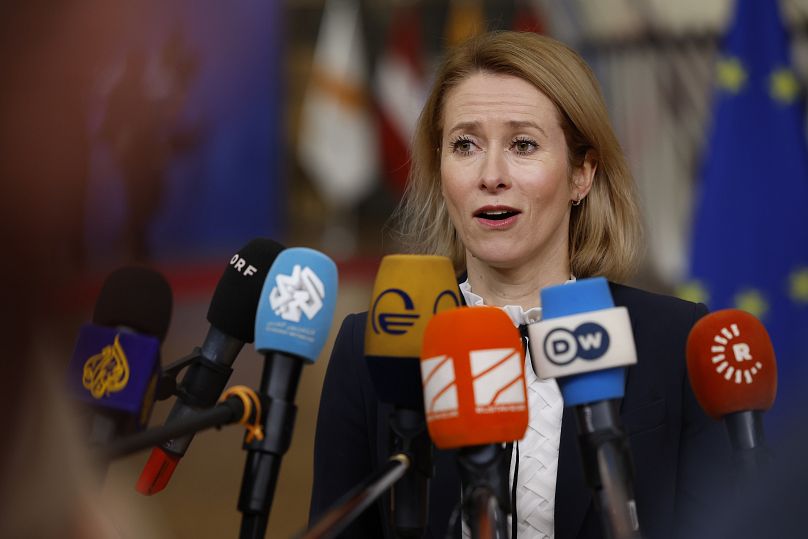 EU foreign policy chief Kaja Kallas speaks with the media as she arrives for an EU summit at the European Council building in Brussels, 19 December, 2024
