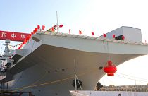 In this photo released by Xinhua News Agency, China's first Type 076 new-generation amphibious assault ship, the Sichuan, is seen in Shanghai, 27 December 2024.