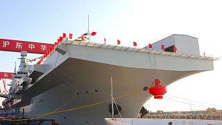 In this photo released by Xinhua News Agency, China's first Type 076 new-generation amphibious assault ship, the Sichuan, is seen in Shanghai, 27 December 2024.