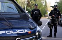 FILE- Police officers stand guard in Madrid, 30 November 2022