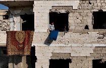 Syrian elderly couple return to ruined home in ghost town Damascus` suburb Harasta