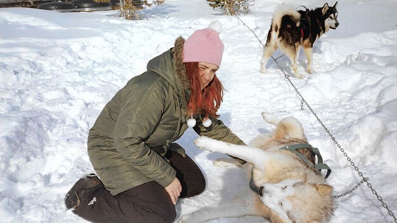 Playing with husky dogs in Tignes