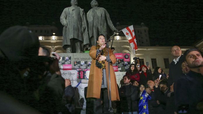 Georgia’s President Salomé Zourabichvili defiantly joins protesters