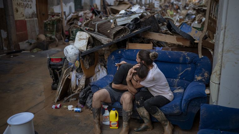 Tania hugs her brother-in-law Baruc after rescuing some of their belongings from their flooded house after the floods in Paiporta, Valencia, Spain Tania hugs her brother-in-law Baruc after rescuing some of their belongings from their flooded house after the floods in Paiporta, Valencia, Spain