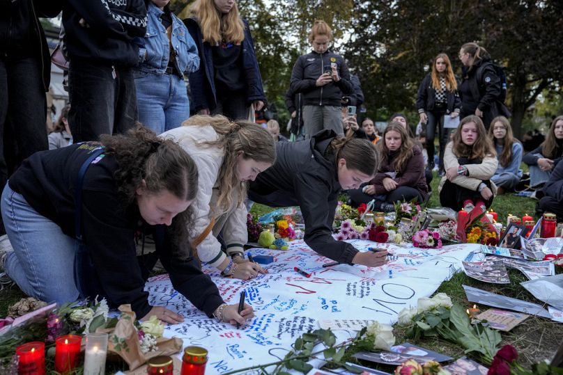 Fans gather to pay tribute to late British singer Liam Payne, former member of the British pop band One Direction in Treptower Park in Berlin, Germany, Sunday, Oct. 20, 2024