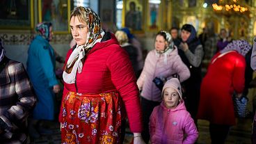A woman leaves at the end of a religious service inside the Saint John the Baptist cathedral in Comrat, the capital of Gagauzia, an autonomous part of Moldova, 2 Nov 2024 A woman leaves at the end of a religious service inside the Saint John the Baptist cathedral in Comrat, the capital of Gagauzia, an autonomous part of Moldova, 2 Nov 2024