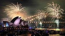 Fireworks explode over Sydney Harbour ahead of New Year's Eve celebrations in Sydney, Tuesday, Dec. 31, 2024.