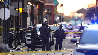 Emergency services attend the scene on Bourbon Street after a vehicle drove into a crowd on New Orleans' Canal and Bourbon Street, Wednesday Jan. 1, 2025.