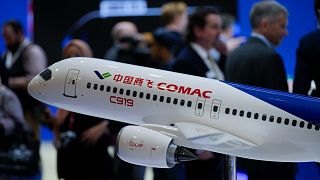 An aircraft model of China's COMAC C919 is on display at the COMAC pavilion during the first day of the Singapore Airshow in Singapore, Tuesday, Feb. 20, 2024. 