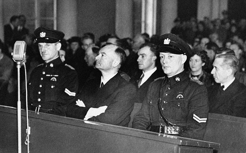Anton Mussert, przywódca holenderskiej Narodowosocjalistycznej Partii, stanął przed sądem specjalnym w Hadze pod zarzutem zdrady, 27 listopada 1945 r.