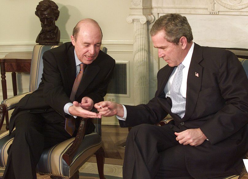 Com o então presidente norte-americano George W. Bush, em 2002