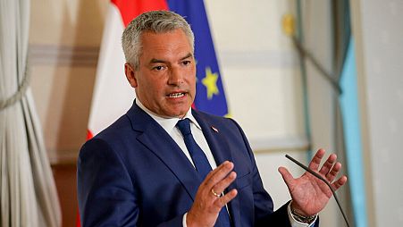 Austrian Chancellor Karl Nehammer attends a press conference in Vienna on Thursday, Aug. 8, 2024. 