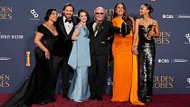 Adriana Paz, from left, Edgar Ramirez, Selena Gomez, Jacques Audiard, Karla Sofia Gascon, and Zoe Saldana with the award for best motion picture.