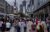 People walk in the main shopping street 'Zeil' in central Frankfurt, Germany.