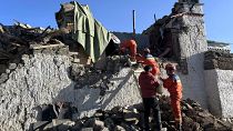 Rescue workers search for survivors in the aftermath of an earthquake in Changsuo Township of Dingri in Xigaze, on Tuesday, Jan. 7, 2025.